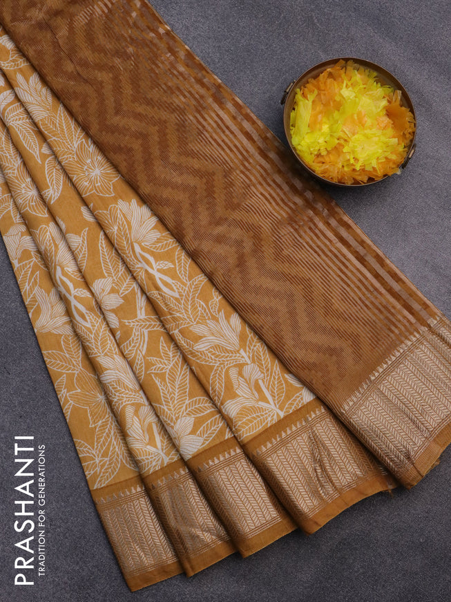 Assam silk saree mustard yellow with allover prints and zari woven border