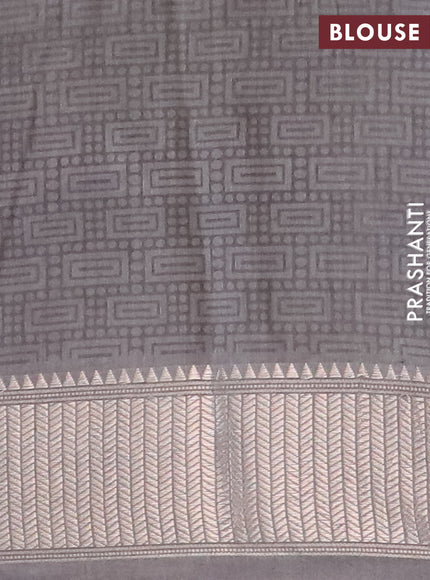 Assam silk saree grey shade with allover floral prints and zari woven border