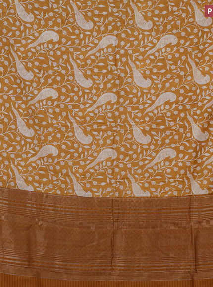 Assam silk saree mustard yellow with allover floral prints and zari woven border