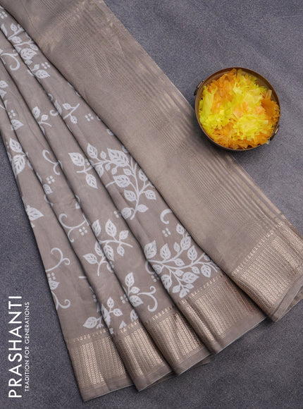 Assam silk saree grey shade with allover prints and zari woven border