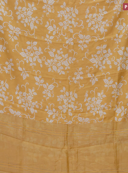 Assam silk saree yellow with allover prints and zari woven border