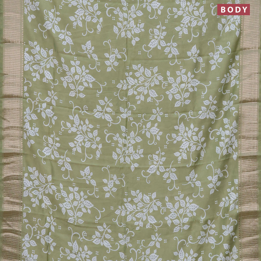 Assam silk saree pastel green with allover prints and zari woven border