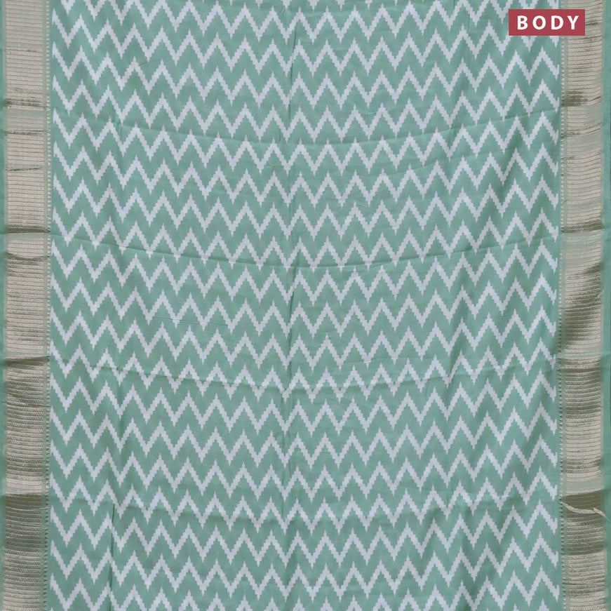 Assam silk saree pastel green with allover zig zag prints and zari woven border