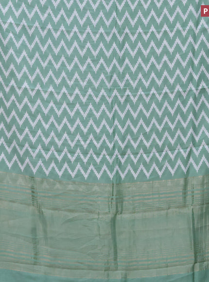 Assam silk saree pastel green with allover zig zag prints and zari woven border