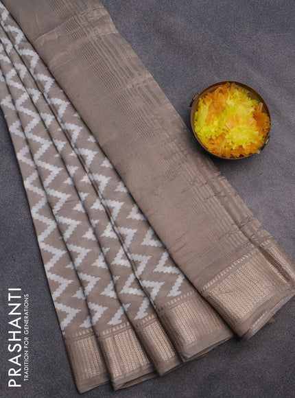 Assam silk saree grey shade with allover zig zag prints and zari woven border