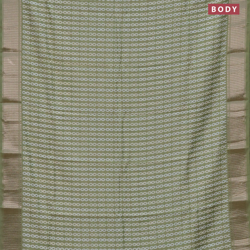 Assam silk saree pastel green with allover prints and zari woven border