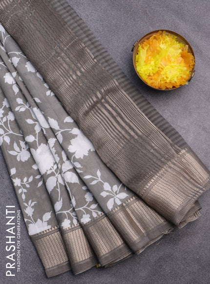 Assam silk saree grey shade with allover floral prints and zari woven border