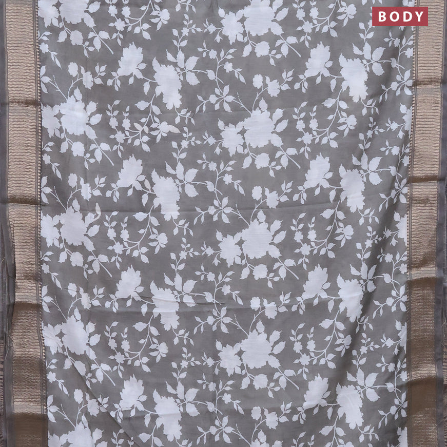 Assam silk saree grey shade with allover floral prints and zari woven border