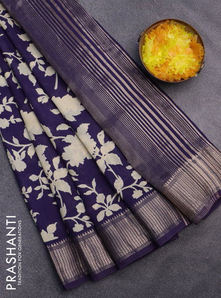 Assam silk saree blue with allover floral prints and zari woven border