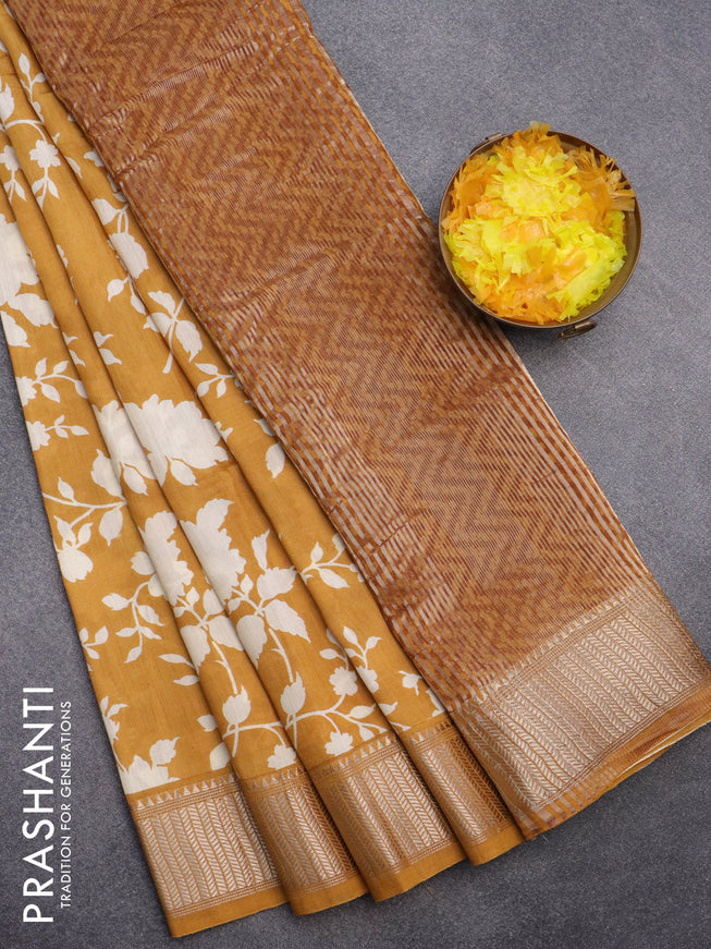 Assam silk saree mustard yellow with allover floral prints and zari woven border