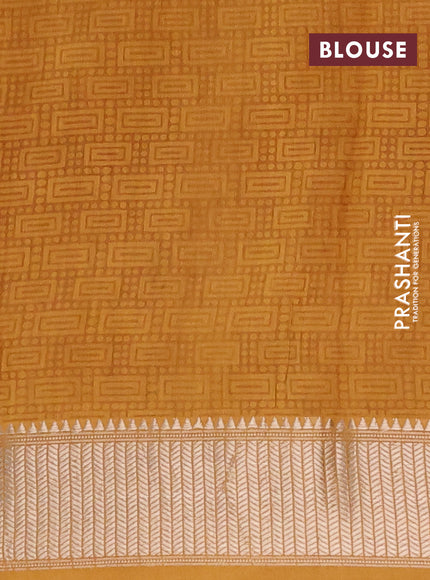 Assam silk saree mustard yellow with allover floral prints and zari woven border