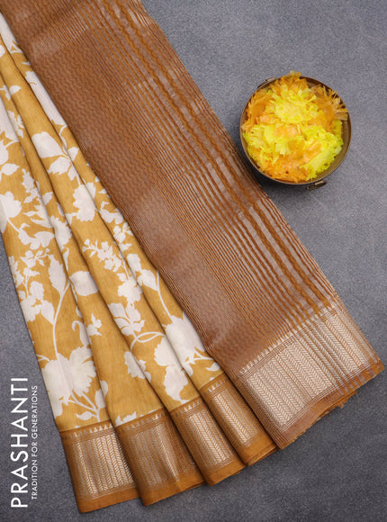 Assam silk saree mustard yellow with allover floral prints and zari woven border