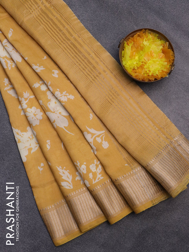 Assam silk saree mustard yellow with allover floral prints and zari woven border