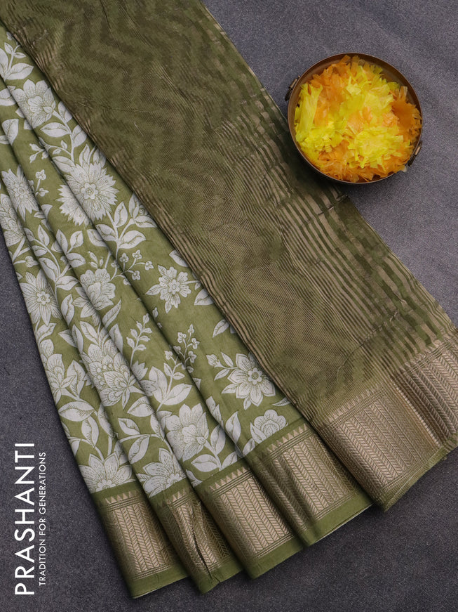 Assam silk saree green shade with allover floral prints and zari woven border