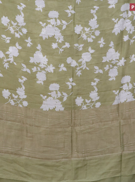 Assam silk saree green shade with allover floral prints and zari woven border