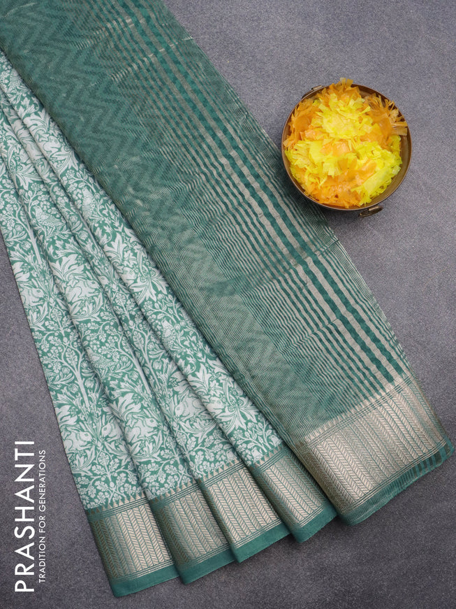 Assam silk saree teal green shade with allover prints and zari woven border