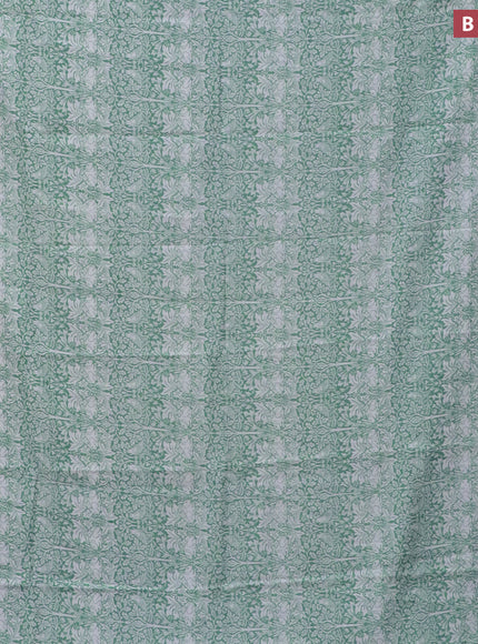 Assam silk saree teal green shade with allover prints and zari woven border