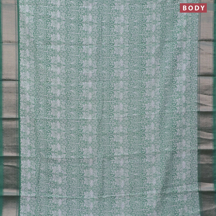 Assam silk saree teal green shade with allover prints and zari woven border