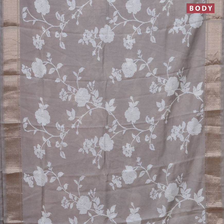 Assam silk saree grey shade with allover floral prints and zari woven border