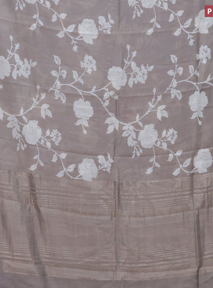 Assam silk saree grey shade with allover floral prints and zari woven border