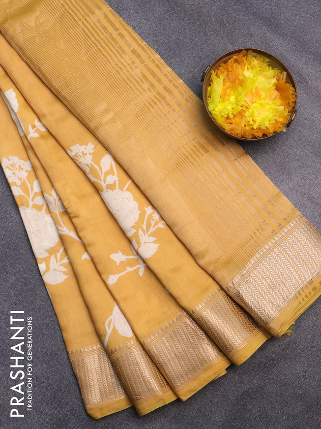 Assam silk saree yellow with allover floral prints and zari woven border