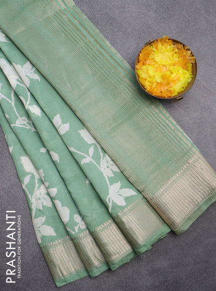 Assam silk saree pastel green with allover floral prints and zari woven border