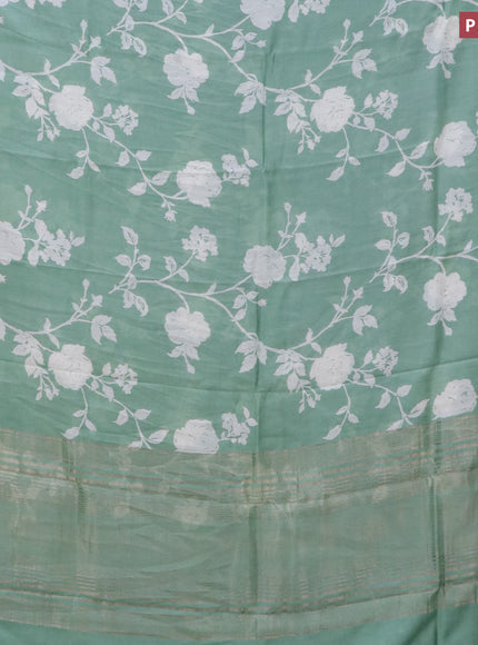 Assam silk saree pastel green with allover floral prints and zari woven border