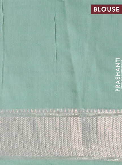 Assam silk saree pastel green with allover floral prints and zari woven border