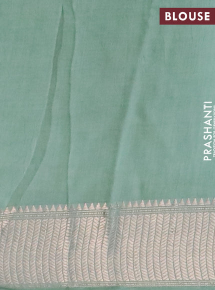 Assam silk saree pastel green with floral butta prints and zari woven border