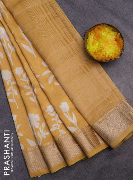 Assam silk saree yellow with floral butta prints and zari woven border