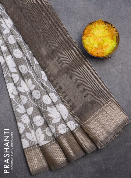 Assam silk saree grey shade with allover prints and zari woven border