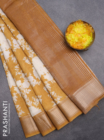 Assam silk saree mustard yellow with allover floral prints and zari woven border