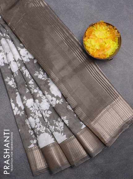 Assam silk saree grey shade with allover floral prints and zari woven border