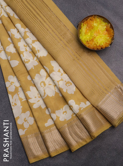 Assam silk saree mustard yellow with allover floral prints and zari woven border