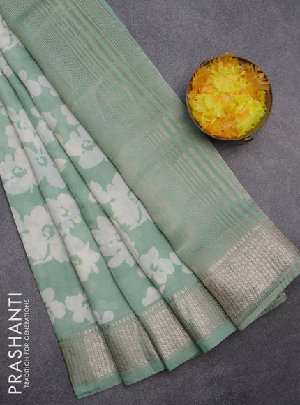 Assam silk saree pastel green with allover floral prints and zari woven border