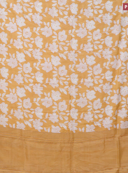 Assam silk saree mango yellow with allover floral prints and zari woven border