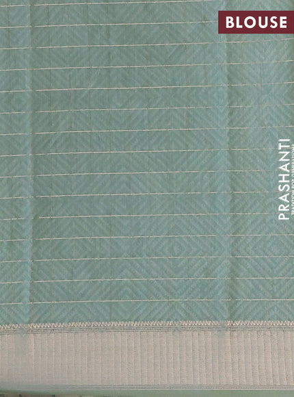 Assam silk saree cream and pastel green with allover zari checks & floral prints and zari woven border