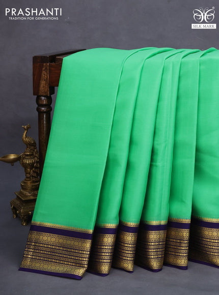 Pure mysore silk saree light green and dark blue with plain body and zari woven border