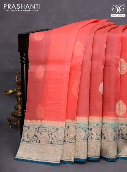 Banarasi organza saree orange and peacock blue with woven buttas and floral zari woven border