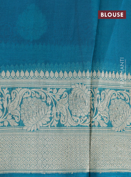 Banarasi organza saree teal blue with woven buttas and woven border