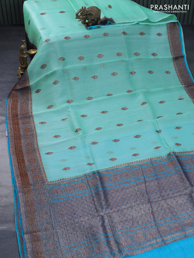 Banarasi organza saree teal blue shade and cs blue with thread & zari woven buttas and banarasi style border