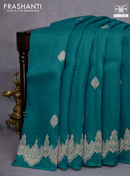 Banarasi organza saree teal blue with woven buttas and zari woven butta border