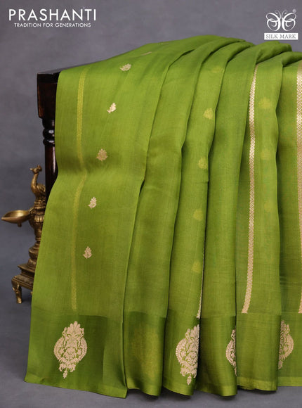 Banarasi organza saree green shade with allover zari weaves and zari woven butta border