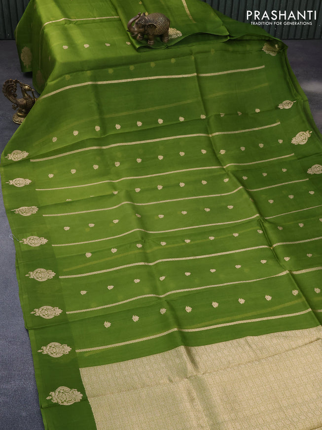 Banarasi organza saree green shade with allover zari weaves and zari woven butta border