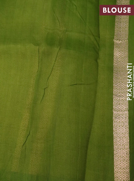 Banarasi organza saree green shade with allover zari weaves and zari woven butta border