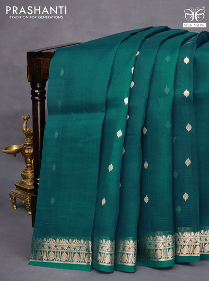 Banarasi organza saree peacock blue with zari woven buttas and zari woven border