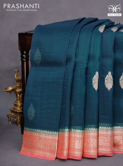 Banarasi organza saree peacock blue and peach orange with zari woven buttas and zari woven border