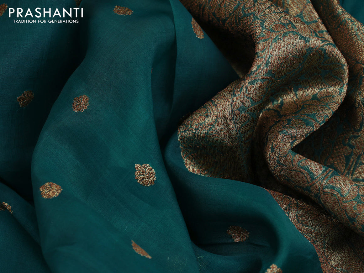 Banarasi organza saree teal green with woven buttas and woven border