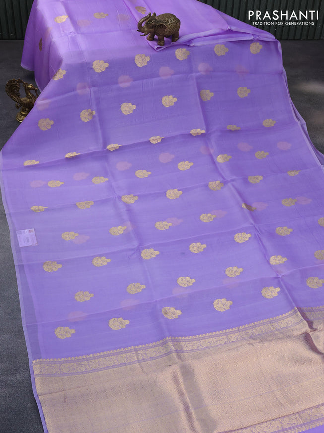 Banarasi organza saree lavender shade with zari woven buttas in borderless style