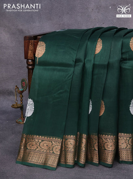 Banarasi organza saree dark green with woven buttas and banarasi style border